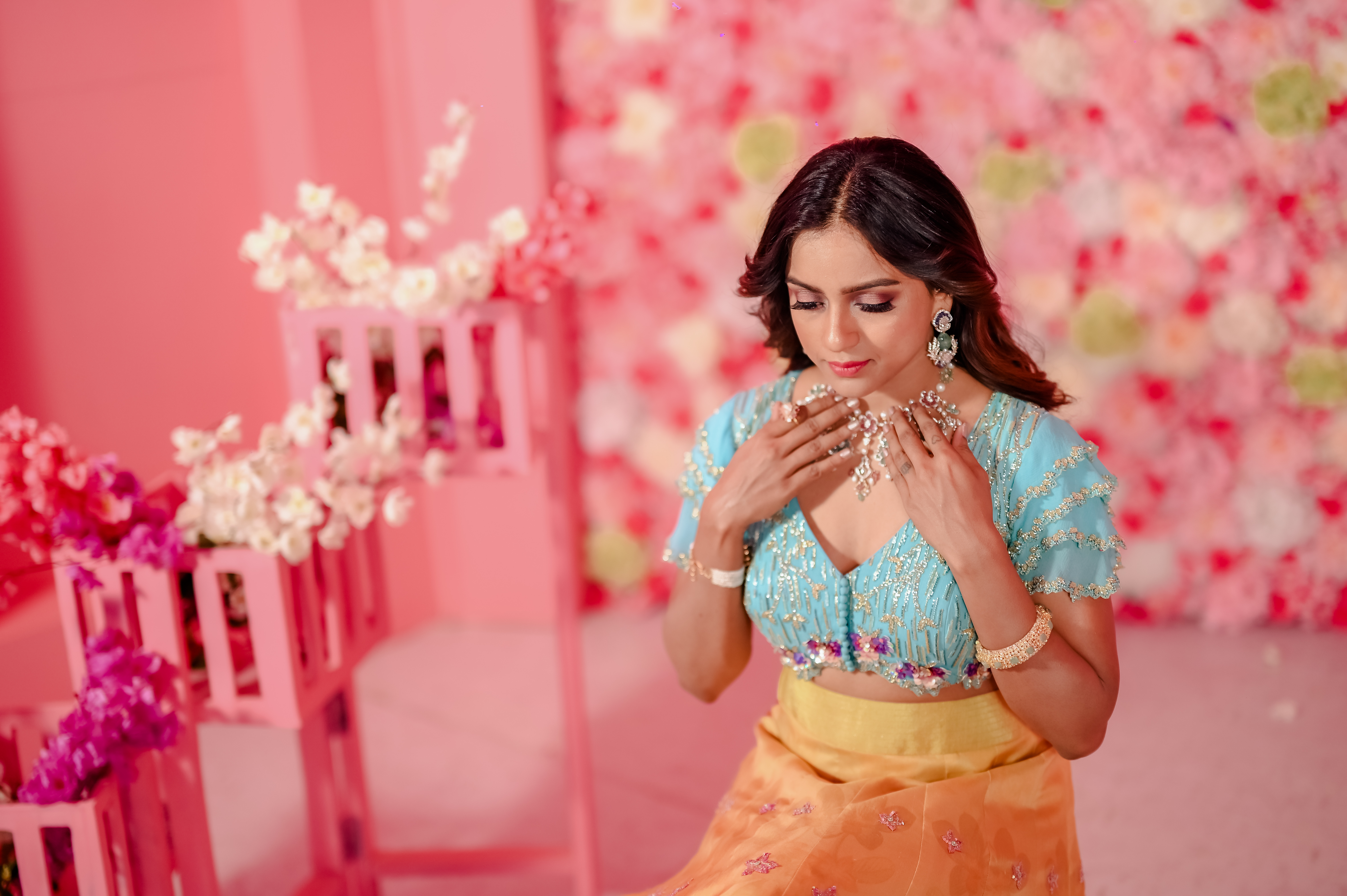 Fashion portrait on warm rose backdrop